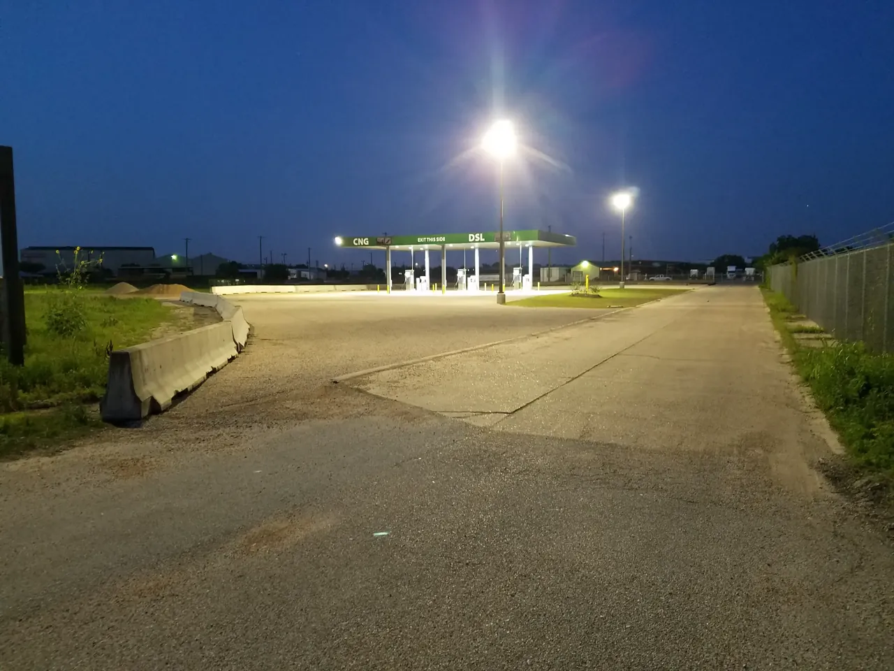 Illuminated Almeda Fuels station and truck-friendly access at night